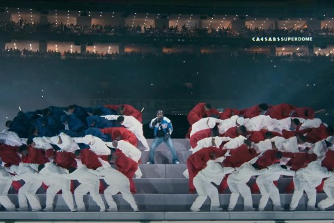 Kendrick Lamar and other perform in the 2025 Super Bowl halftime show.